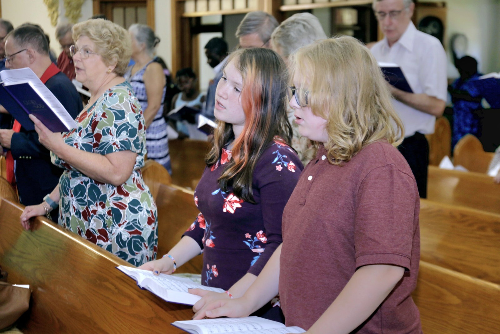 Church members sharing a moment together after worship