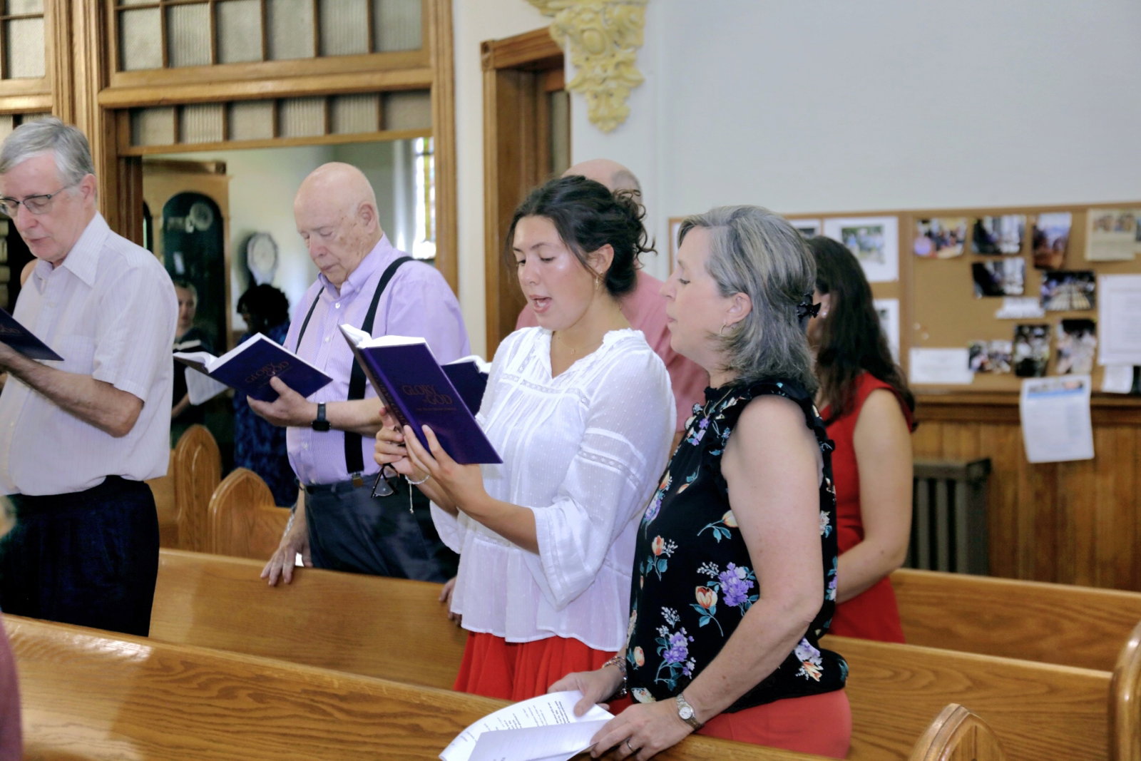 Friends greeting one another during a church gathering