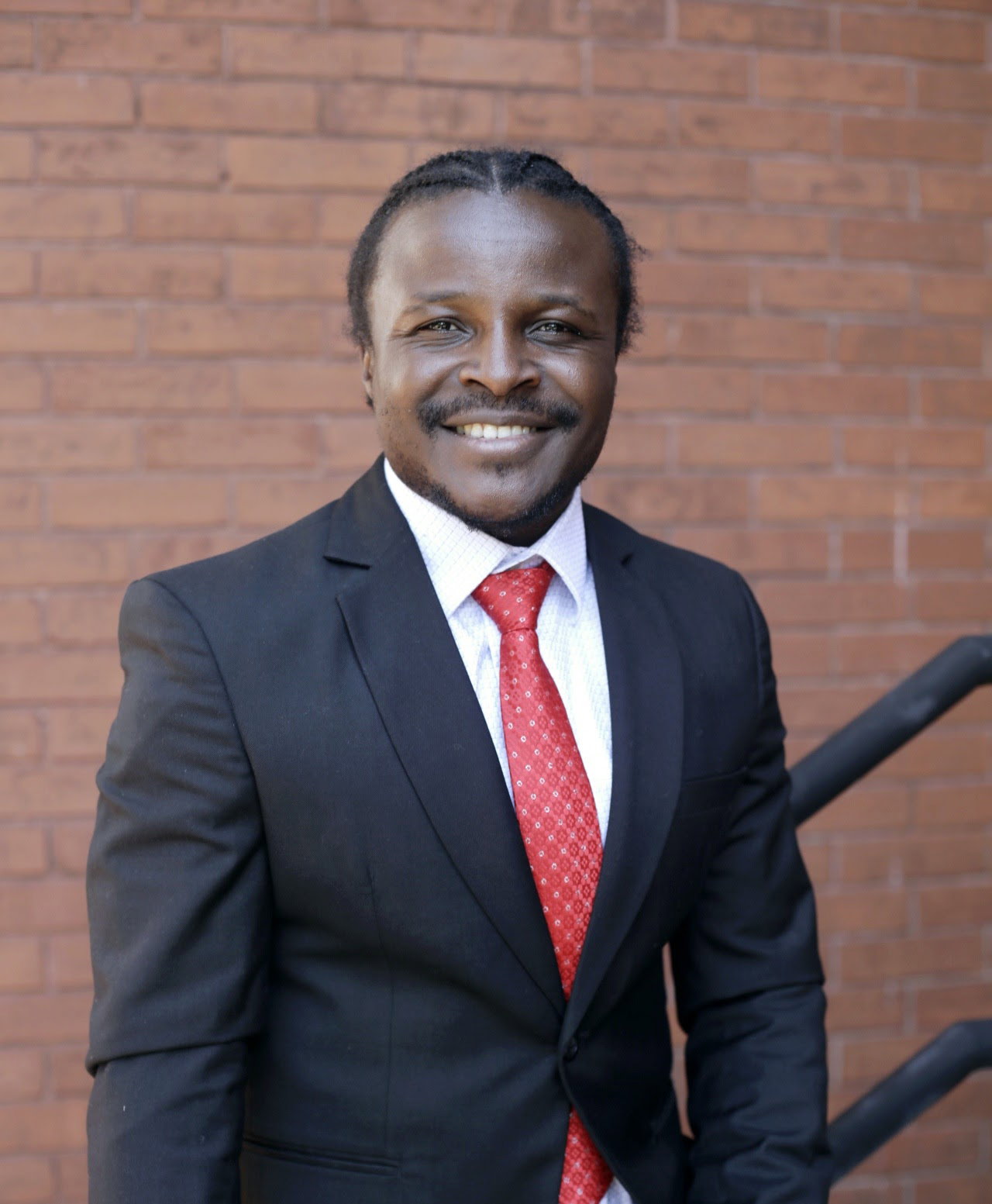 Portrait of Reverend Mwat Asedeh, installed pastor of Stewartstown Presbyterian Church