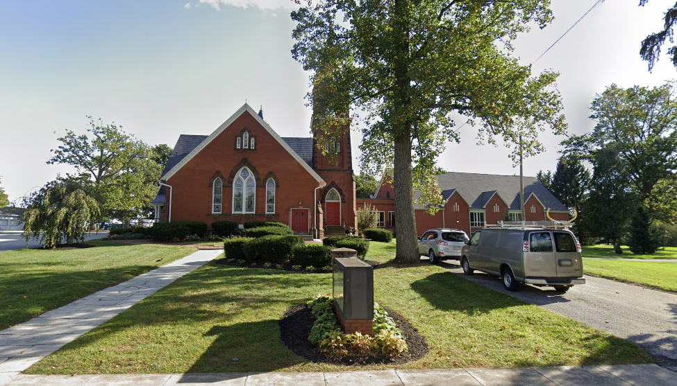 Red brick Stewartstown Presbyterian Church building on College Avenue